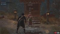 She will be standing right in front of the shrine, so speak to her to finish the quest.