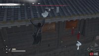 There is an open window to climb through if you use Naoe.