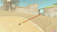 Cut across the sand on the second corner and go through the gap.