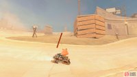 From the last panel, go around the corner and take the path across the sand.