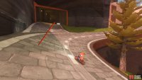 Go through the tunnel and follow the track around the corner.