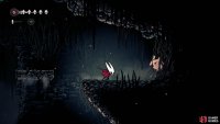 Head in a sort of upwardly direction to find a flea location by the cliff edge in the Marrow&rsquo;s northern central region. Image via Gamer Guides / Team Cherry.