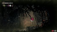 Continue along the bottom pathway, once again avoiding spikes and the pendulum blades to reach the roots you need to break to restore the bench. Image via Gamer Guides / Team Cherry.